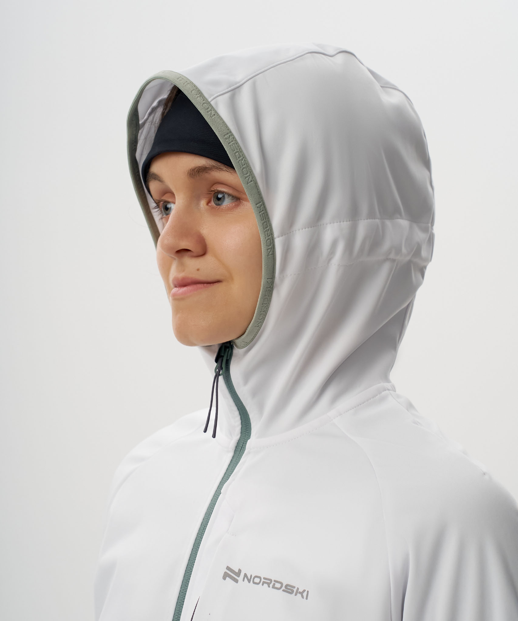 Тренировочная куртка Nordski PRO TOUR HOOD White/Dark Mint/Ice Mint W